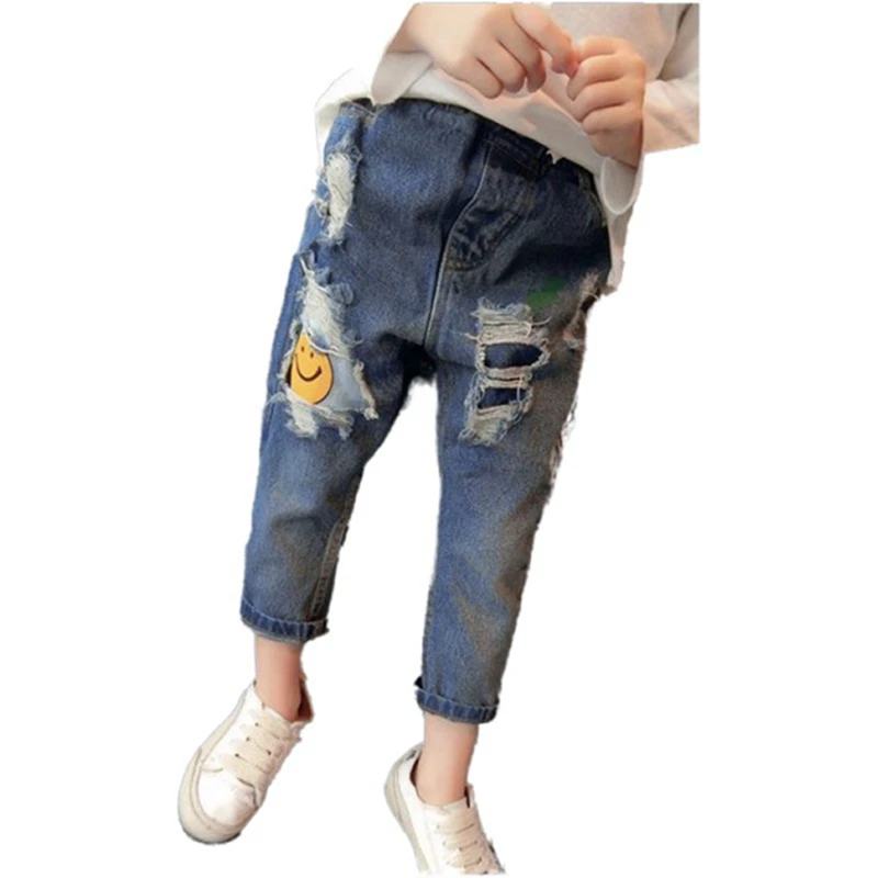 Chlapci a dievčatá na jar a na jeseň džínsy cartoon smajlík otvor nohavice mid-pás, elastický pás hrubé rovné nohavice