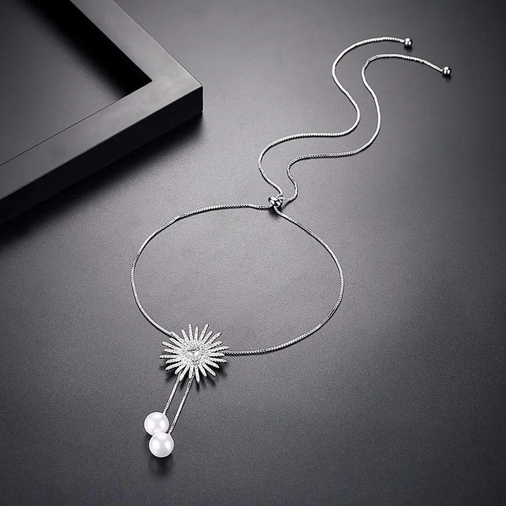 SINZRY gorgous šperky simulované pearl kubický zirkón slnečnice oslňujúci dlhé náhrdelníky pre ženy šaty, šperky príslušenstvo