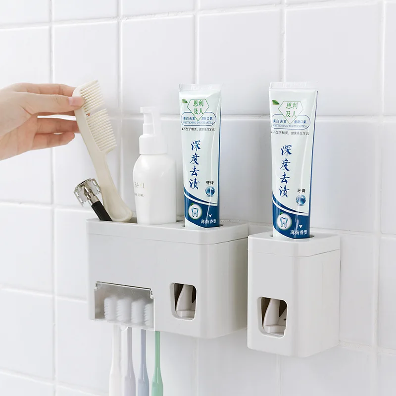 Zubná pasta zubná kefka držiteľa v kúpeľni lepiacou pastou držiak na stene visí automatické zubná pasta vytláčacie kefka držiteľ