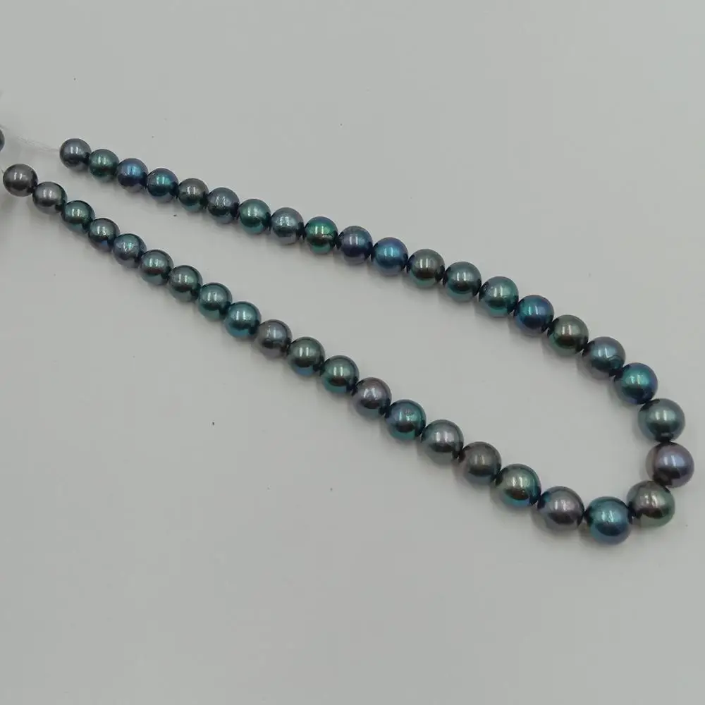 16 palcov ,10-11 mm čierny okrúhly sladkovodné perly , sladkovodná voľné perla s okrúhly tvar, vysoký lesk v oblasti činnosti
