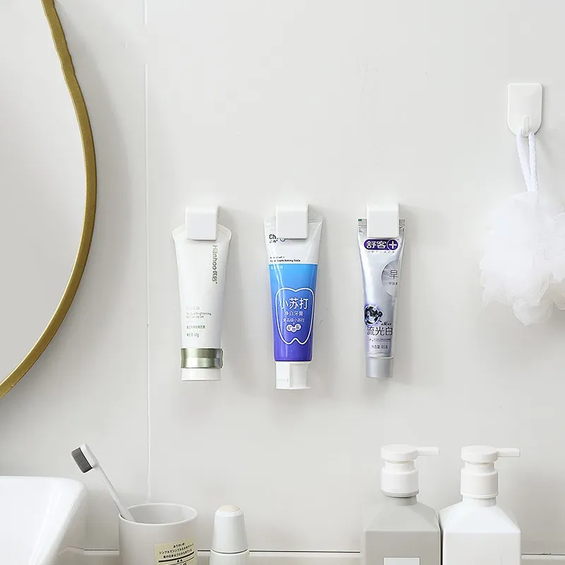 2020 nová Kúpeľňa dodávky zavesenie multi-purpose kúpeľňa zubná pasta čistiaci rack starostlivosti o pleť, plastové závesné klip